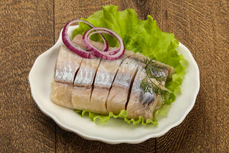 Sliced Herring fillet with dill and onion