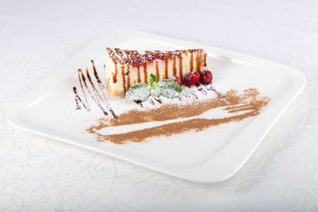 Cheesecake with cherry and mint