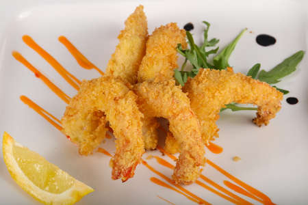 Crispy prawns served lemon sliceの写真素材