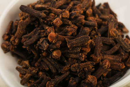 Clove seeds in the bowl - cpice for cuisine