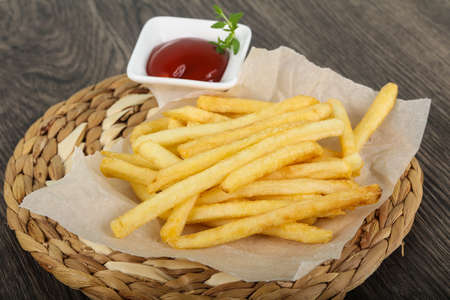 French fries with tomato ketchupの写真素材