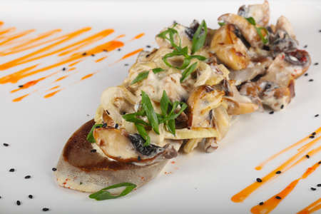 Roasted tongue with mushroomsの写真素材