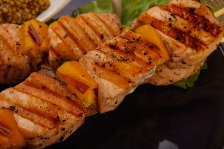 Grilled salmon skewer with dijon mustars sauceの写真素材