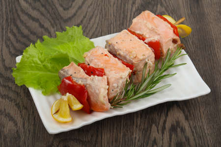 Salmon Skewer with pepper and lemonの写真素材