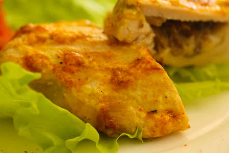 Roasted chicken breast with salad leavesの写真素材