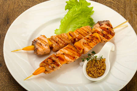 Grilled salmon skewer with dijon mustars sauceの写真素材