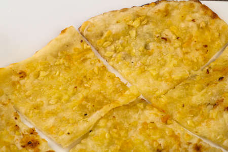 Indian bread - Naan with cheese and garlicの写真素材