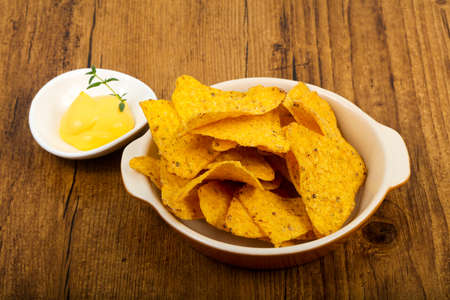 Nachos with cheese sauceの写真素材
