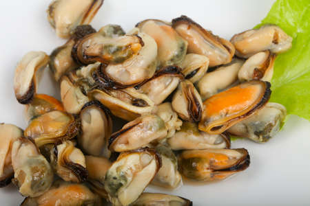 Pickled mussels with salad leaves