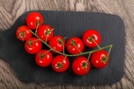Cherry tomato on the branchの写真素材