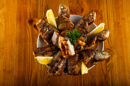 Grilled trout with lemon and parsley