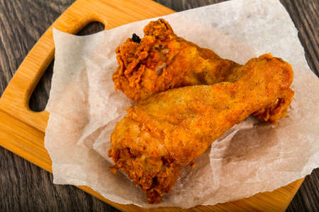 Crispy chicken legs with  ketchupの写真素材