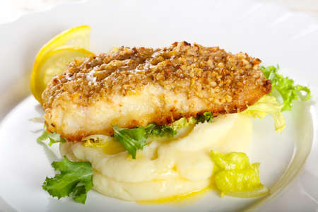 Baked Cod fish with mashed potatoの写真素材