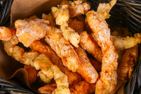 Prawn tempura with sauce over wooden backgroundの写真素材