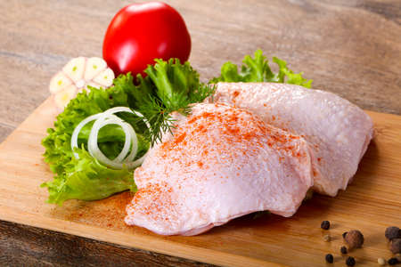 Raw chicken thighs for cookingの写真素材