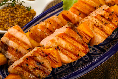 Grilled salmon skewer with dijon mustars sauceの写真素材
