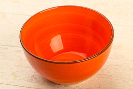 Empty plate for home or restorant over wooden backgroundの写真素材