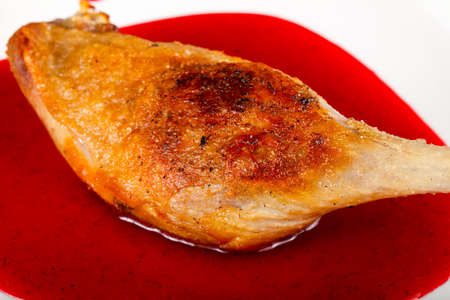 Duck leg in berry sauceの写真素材