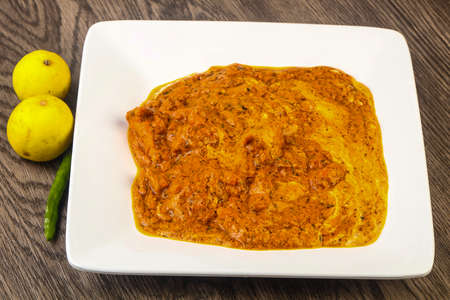 Indian traditional cuisine - Butter chicken with creamの写真素材
