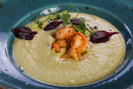 Broccoli cream soup with prawnの写真素材