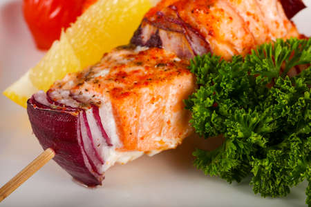 Salmon skewers with vegetablesの写真素材