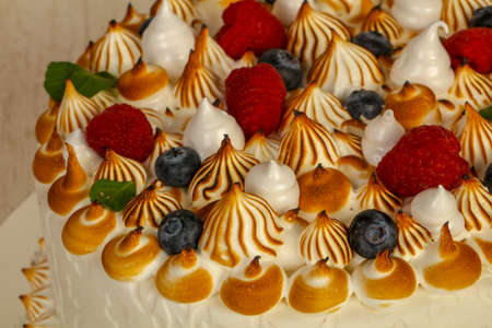 Wedding cake with berries and creamの写真素材