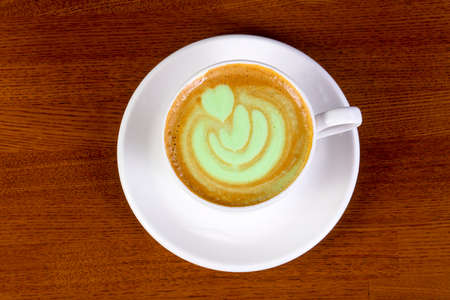Hot Green cappuccino with cream