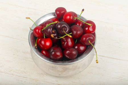 Sweet cherry in the bowlの写真素材