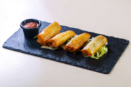 Spring roll with tomato sauce 
