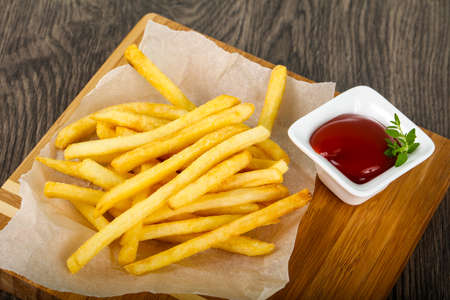 French fries with tomato ketchupの写真素材