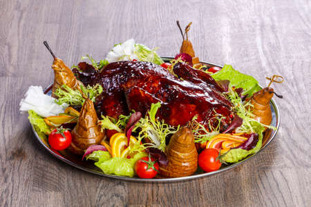 Duck baked with pear and sauceの写真素材