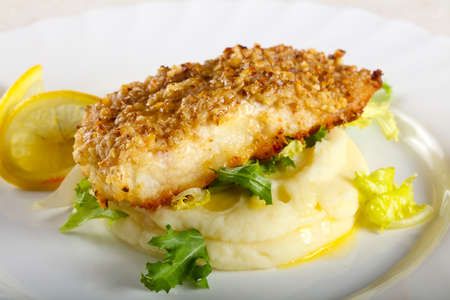 Baked Cod fish with mashed potatoの写真素材