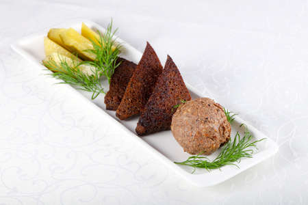 Liver spreas with bread and pickled cucumbers