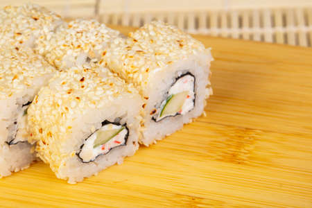 Tasty California rolls with sesame seeds and gingerの写真素材