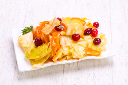 Traditional fermented cabbage sauerkraut in the bowlの写真素材