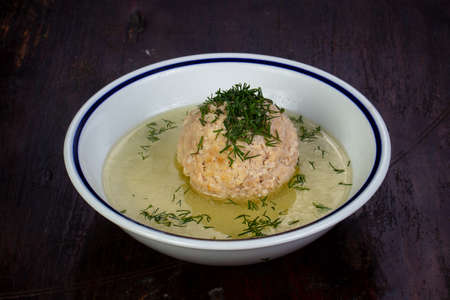 Soup with meat ball and dill