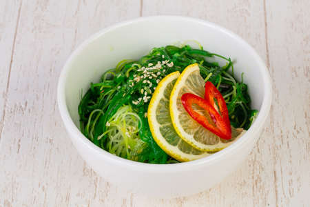Asian traditional Chukka salad with lemonの写真素材