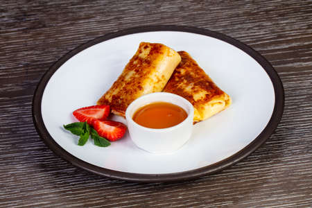 Delicious homemade pancakes with cottage cheese and berries