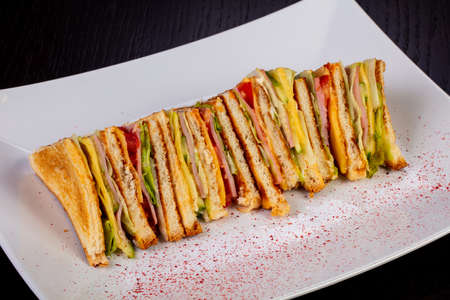 Delicious grilled ham sandwiches with vegetablesの写真素材