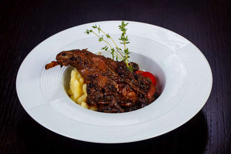 Delicious fried rabbit with prunes