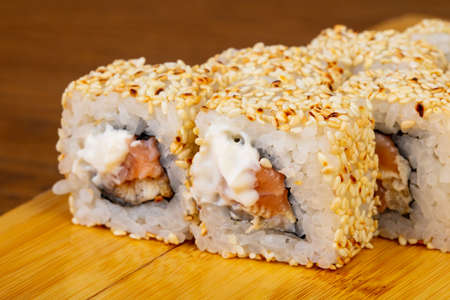 Tasty Alaska rolls with sesame