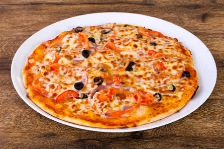 Pizza with ham and cheeseの写真素材