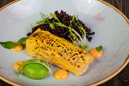 Roasted salmon with salad and sauces