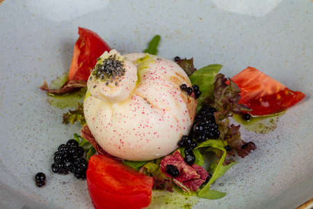 Buratta salad with tomato and olive oilの写真素材