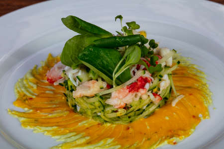 Salad with crab, avocado and shrimpsの写真素材
