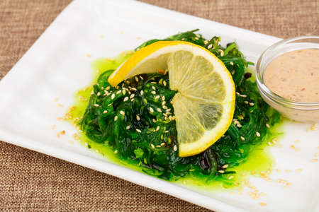 Chukka salad with sesame seeds and sauceの写真素材