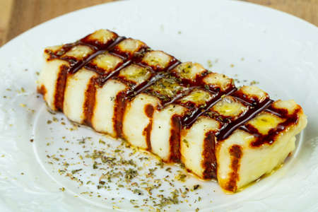 Grilled halloumi cheese with olive oilの写真素材