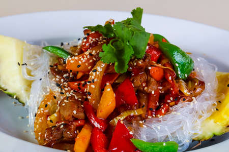 Pineapple with rice noodle and pork meatの写真素材