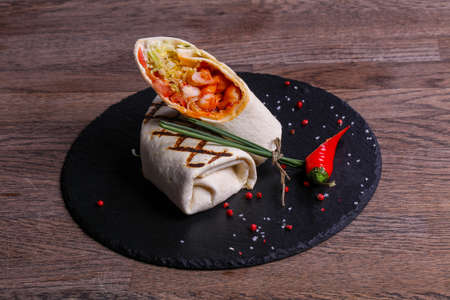 Chicken roll with tortilla served pepperの写真素材
