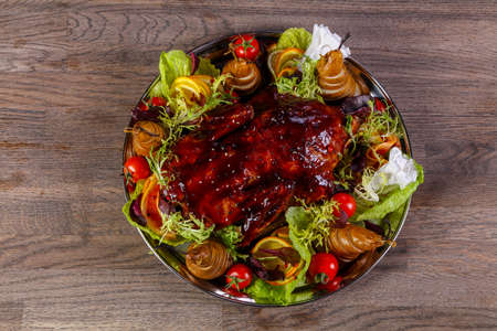 Duck baked with pear and sauceの写真素材